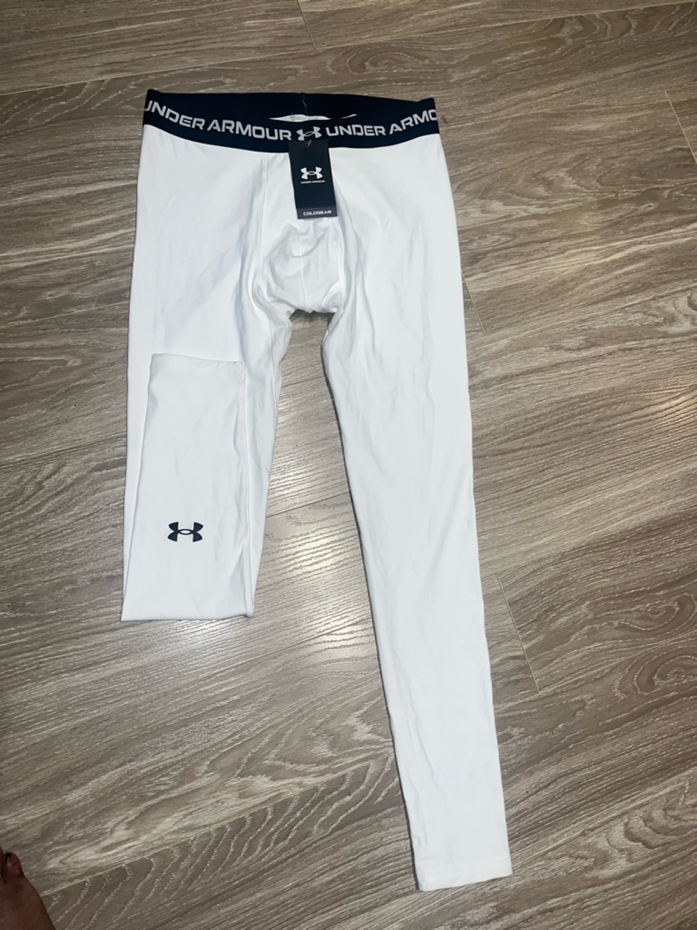 Under Armour Men’s White Long Sleeve Performance Tee with Black Logo